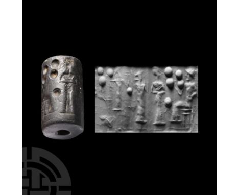 2nd-1st millennium B.C. With frieze depicting two standing robed figures before a crowned figure on a throne, symbols in the 