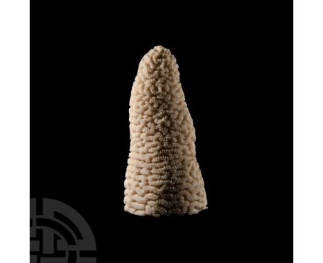 20th century A.D. A free-standing conical tower of vintage brain coral formed in the round.   833 grams, 16 cm high (6 1/4 in