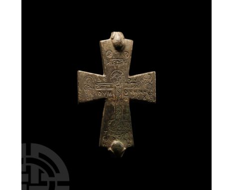 10th-12th century A.D. The frontal section of an enkolpion, with the representation of crucified Jesus among Saint Mary and S