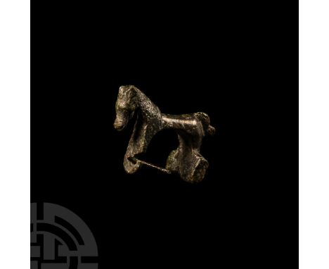 Circa 2nd century A.D. Modelled in the round, the neck with small engraved lines indicating mane, narrow body, short tail, th