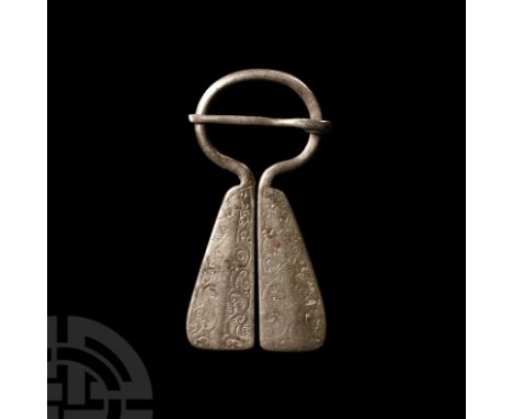 Circa 12th-14th century A.D. Mordvinian type with scrolled tendrils reserved against a hatched field. See Sedov, B.B., Finno-