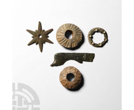 14th-15th century A.D. Comprising a variety of artefacts: a spur rowel; spindle whorl with linear ornament; spindle whorl wit