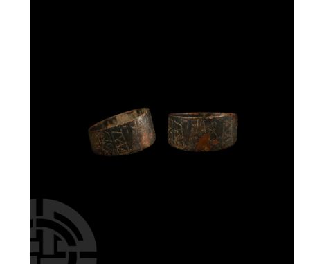 Dated 1918 A.D. Composed of a flat-section hoop with expanded bezel, shallow inscribed volute hearts and geometric motifs to 