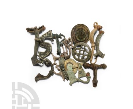 Circa 2nd-4th century A.D. Comprising a variety of brooch types, including openwork plate brooches; ornate trumpet brooches; 