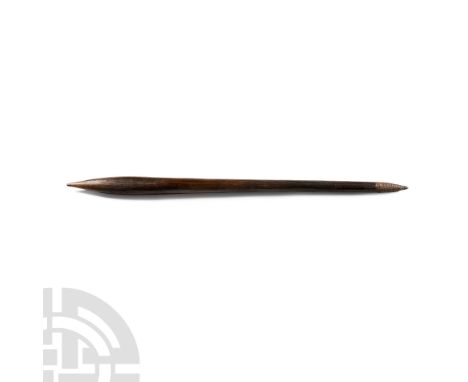 19th century A.D. The round-section shaft with one tapered end and a pointed, bulbous head.   435 grams, 69 cm (27 1/8 in.). 