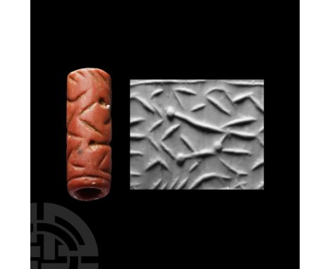 2nd-1st millennium B.C. With incised linear ornament and drilled pellets. Cf. Teissier, B., Ancient Near Eastern Cylinder Sea