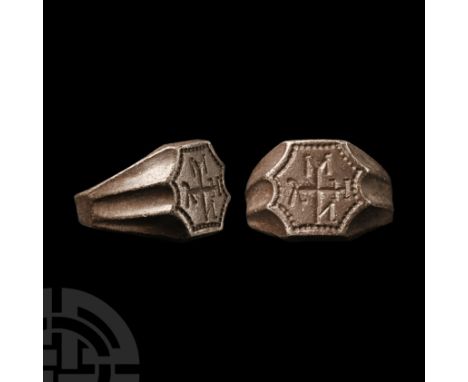 15th-17th century A.D. With fluted shoulders and scooped edges to the bezel, pointillé border and Greek monogram of a cross w