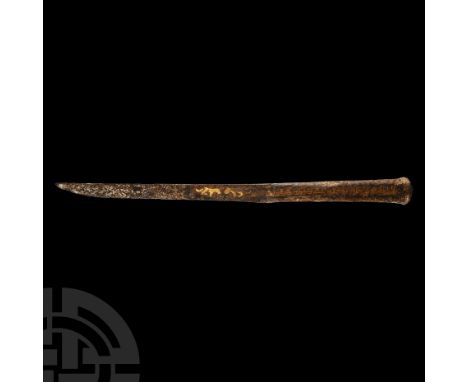 10th-12th century A.D. Composed of a C-shaped socketted hilt and slender blade with single cutting edge slightly curved towar