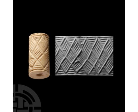 Circa 3rd millennium B.C. With incised braided design forming diamond-shape hatching. Cf. Teissier, B., Ancient Near Eastern 