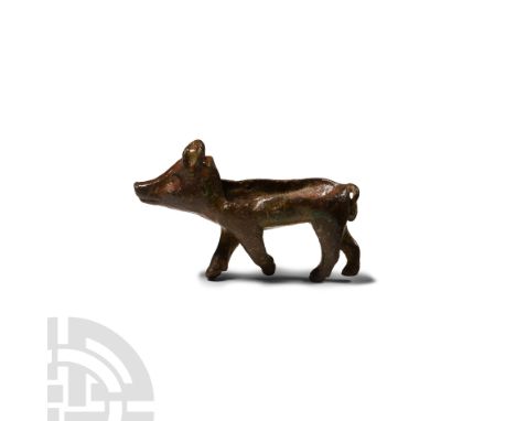 1st century B.C.-2nd century A.D. Modelled in the round with semi-naturalistic detailing, curly tail, coat detailing; recess 