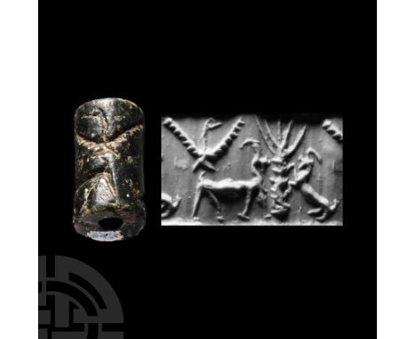 2nd-1st millennium B.C. With frieze depicting a bird with wings spread above an advancing canine, tree and leaping goat. Cf. 