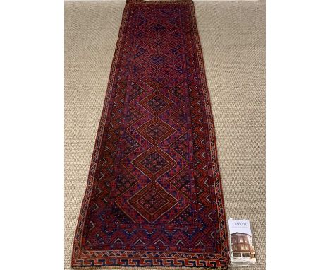 TURKISH WOOLLEN CARPET RUNNER , red and blue ground with repeating diamond pattern, 260 x 70cms