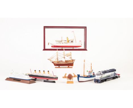 NAVIGATOR MODERN SMALL SCALE MODEL OF A STEAM BOAT, 'Schaarhom' in display case, four other small models of boats/ships.  TOG