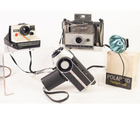 EUMIG SUPER 8 CINE CAMERA, in case and two Polaroid CAMERAS (3)