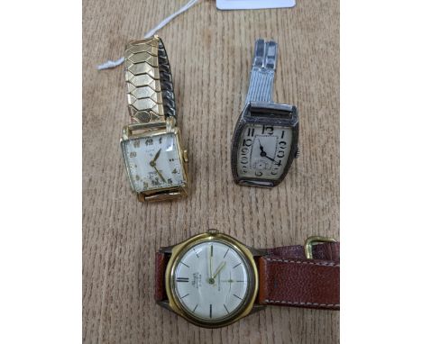 A group of three vintage wristwatches to include a silver cased square faced ladies wristwatch A/F on later mesh bracelet, an