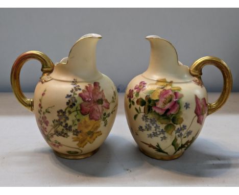 A pair of Royal Worcester blush ivory jugs numbered 1094, 10.5cm h Location: 