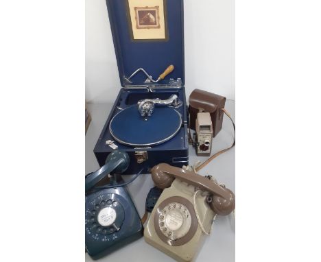 A vintage Keith Prowse gramophone together with two vintage BT telephones and a Bell & Howell 8mm hand projectorLocation: 