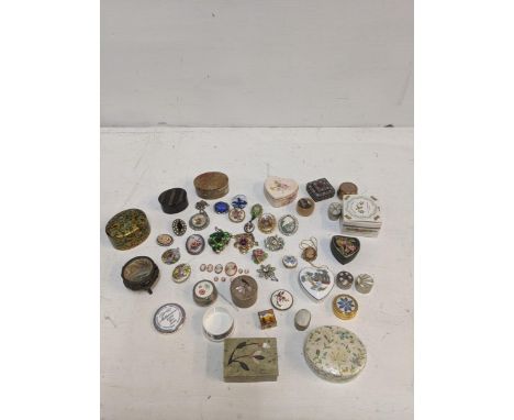 A collection of pill ring boxes to include a Victorian example, papiermache, mother of pearl and others, and costume jeweller