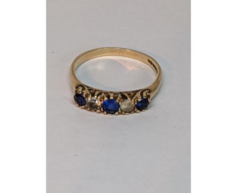 A 9ct gold ring inset with blue and white sapphires, total weight 2.0gLocation: 