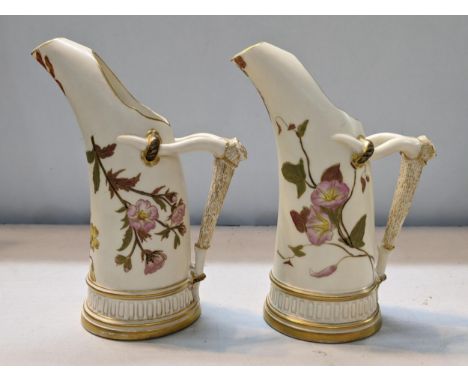 A pair of Royal Worcester blush ivory porcelain jugs numbered 1116 Location: 