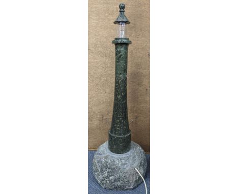 A large mid 20th century Cornish lighthouse shaped table lamp, modelled on a rough rocky base, 86cm hLocation: 