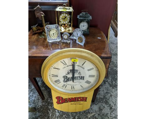 A group of clocks and other items to include a quartz Beamish Brewery wall hanging clock, a brass framed Kundo quartz anniver