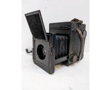 A Soho Ltd folding camera having a Ross London lens Location: 