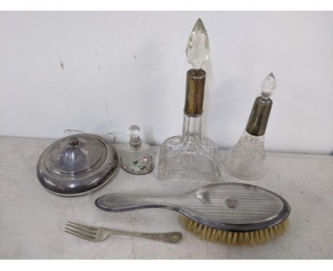 A group of silver dressing table items to include a silver topped and glass powder bowl and cover, two glass scent bottles wi