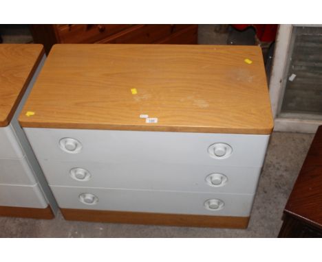 A Stag light oak and cream painted three drawer bedroom chest, 82 cm wide x 44 cm deep x 64 cm high (slight wear)