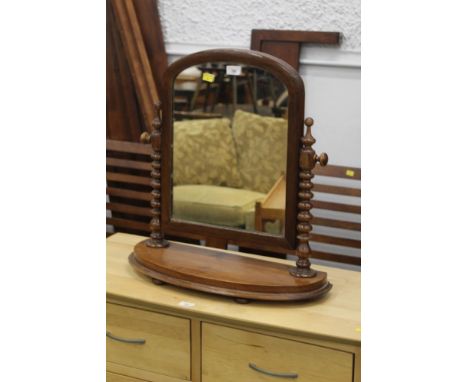 A Victorian mahogany dressing table mirror with bobbin turned columns 