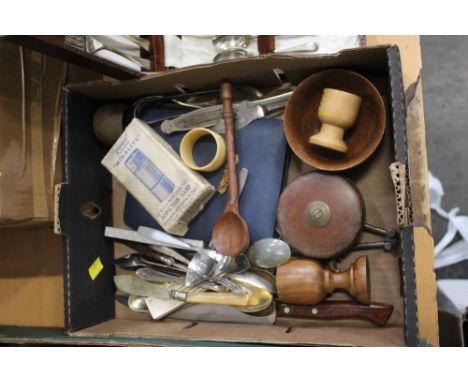 Box of cutlery, Treen egg cups, tape measure, 12 volt magnet inspection lamp etc