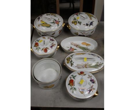 Eight pieces of Royal Worcester pottery "Evesham" pattern tableware, comprising four lidded tureens, oval tureen and cover, o