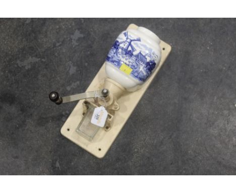 A Vintage coffee grinder with Delft ceramic body 