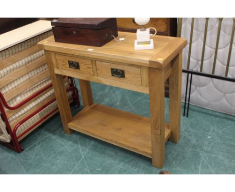 A modern light oak hall table with two drawers and shelf, height 85 cm, width 1 meter, depth 40 cm