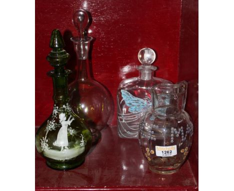 A late 19th century Austrian glass Isle of Man commemorative jug, 15 cm high (flake chip to rim), a late 19th century green g