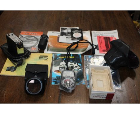 A Pentax Asahi ES 35 mm camera, 2 spare lenses, light meter etc 