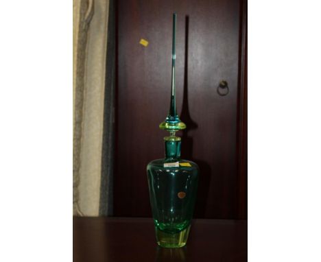 A large Murano blue, green and yellow glass decanter and stopper, 56 cm high and a ditto ewer 28 cm high, both bearing labels