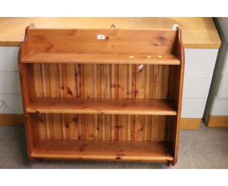 A pine three shelf wall rack, 77 cm wide x 20 cm deep x 76 cm high 