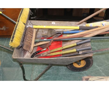 A wheelbarrow and a small quantity of garden and outdoor tools and brushes (P20055) 