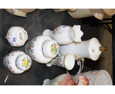 An Aynsley bone china "Cottage Garden", pattern electric table lamp, 38 cm high a ditto vase, 23 cm high, a ditto lidded vase