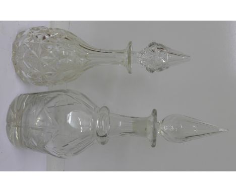 A Georgian decanter and a Victorian decanter with associated stopper