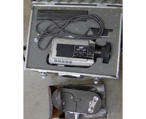 A Keystone 16mm camera and an early JVC camcorder in metal case
