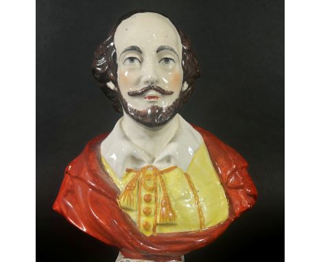 A 19th century Staffordshire Prattware figure of William Shakespeare on a simulated marble style base, 24 high 