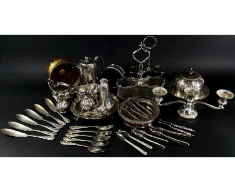 A quantity of silver plated table ware, including two bottle stands, a muffin dish, sauce boat, sugar bowl, a pair of squat c