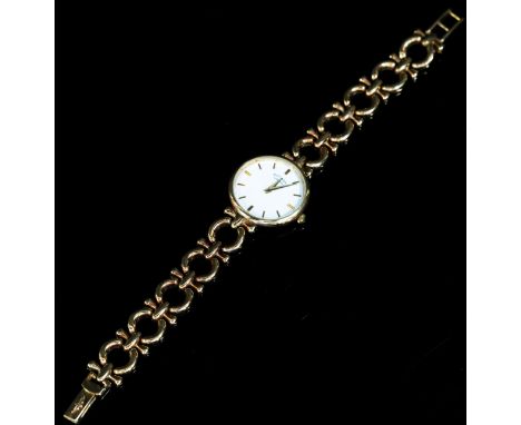 Rotary: A lady’s 9ct yellow gold wristwatch on 9ct strap (marked ‘9K’) gross weight 21.8g, cased.
