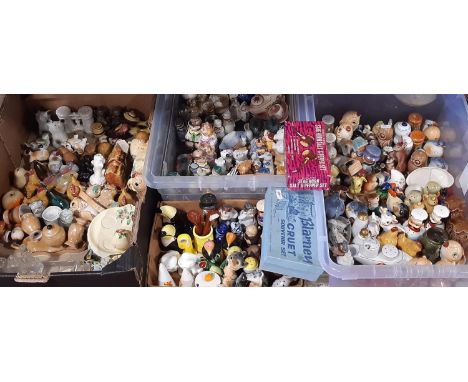 An extensive collection of novelty ceramic condiment sets - some with egg cup combined, subjects to include animals, fruit, b