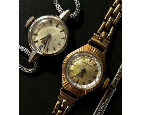 Omega: A lady’s 9ct white gold wristwatch on stainless steel strap together with a lady’s yellow metal cased Rotary wristwatc