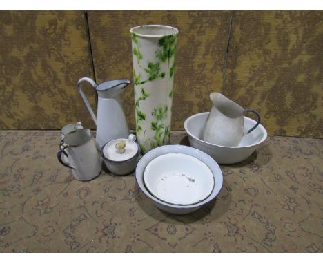 Mixed vintage domestic enamel wares to include jugs, bowls, a chamber stick, a floor-standing vase with painted finish etc (g