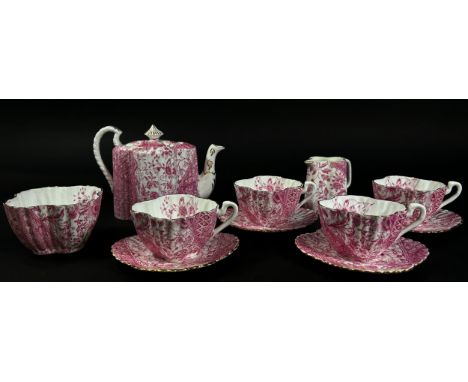 A 19th century J F Wileman porclain tea service for four each piece in a pink and white colourway, including teapot, sugar bo