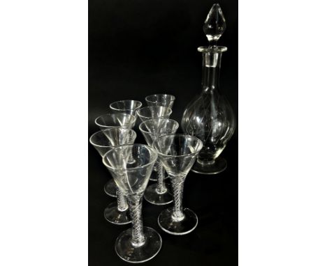 Eight similar 18th century style trumpet drawn wine glasses on helix air twist stems, 13.5cm high, together with a slender de
